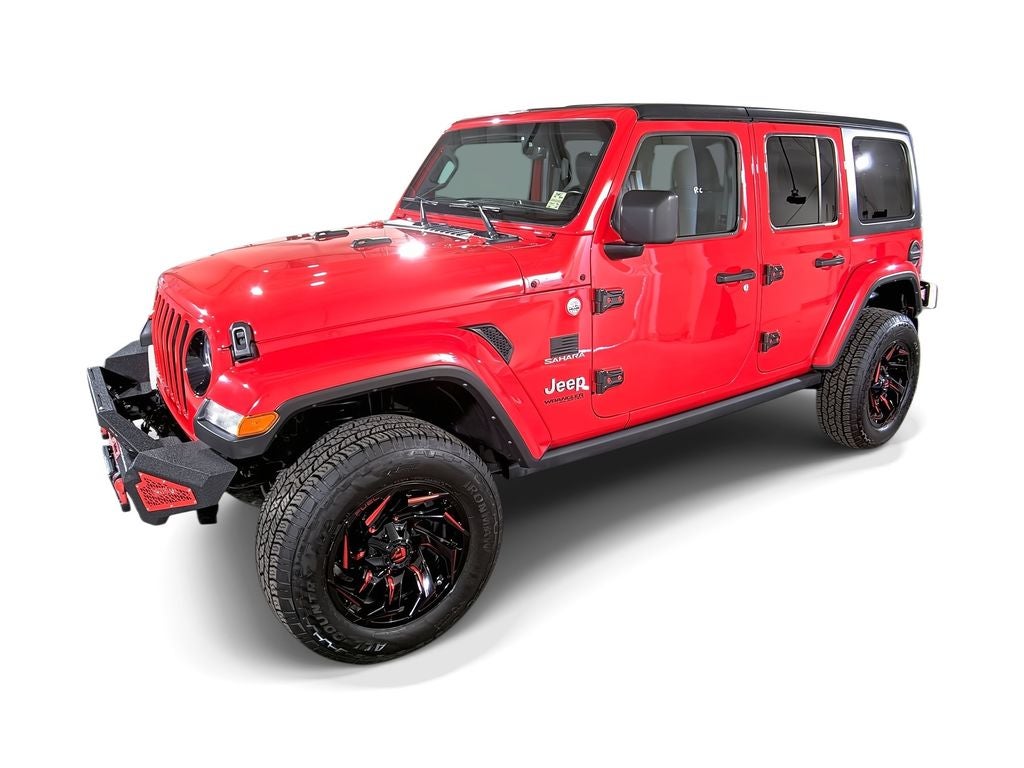 2021 Jeep Wrangler Unlimited Sahara in Firecracker Red Clearcoat — front three-quarter view