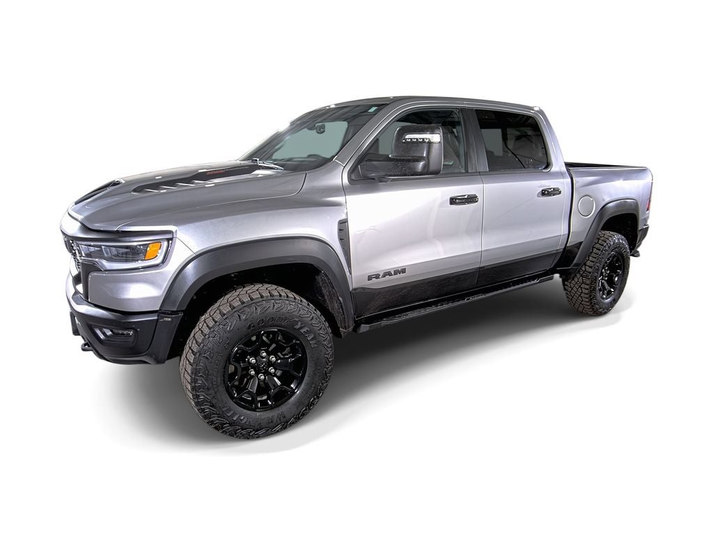 2025 RAM 1500 RHO Crew Cab 4x4 5'7" Box in Silver — front three-quarter view