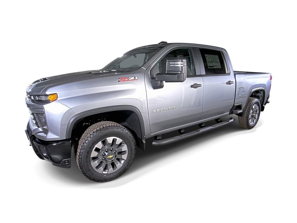 2026 Chevrolet Silverado 2500 HD Custom in Sterling Gray Metallic — front three-quarter view