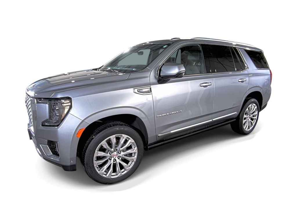 2024 GMC Yukon Denali in Sterling Metallic — front three-quarter view