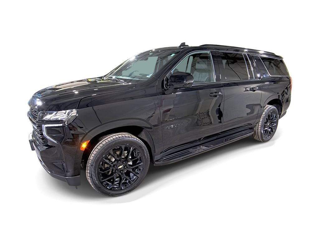 2023 Chevrolet Suburban RST in Black — front three-quarter view