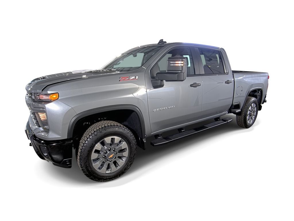 2026 Chevrolet Silverado 2500 HD Custom in Sterling Gray Metallic — front three-quarter view