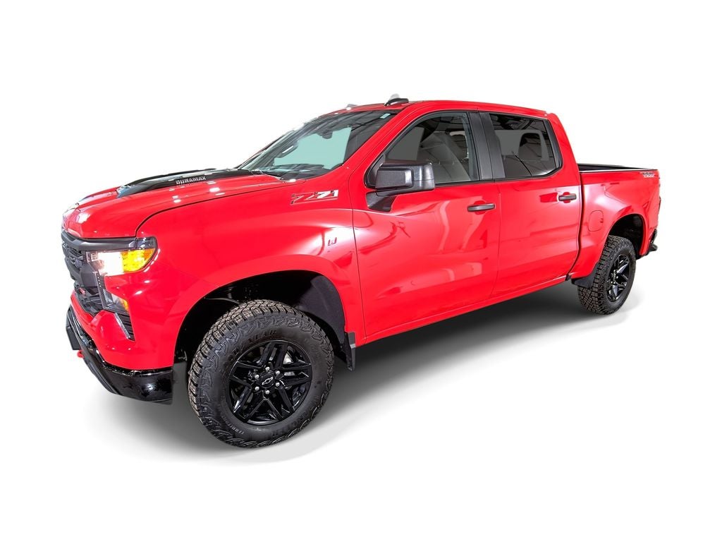 2025 Chevrolet Silverado 1500 Custom Trail Boss in Red Hot — front three-quarter view